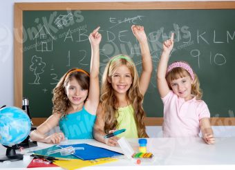 clever kids student group at school classroom smart group of student kids at school classroom raising hand